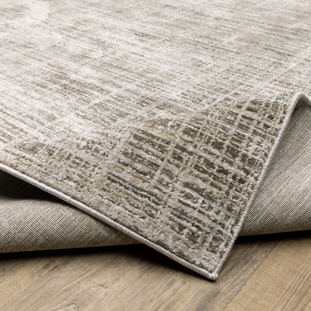 2' X 8' Beige Grey Ivory Tan And Brown Abstract Power Loom Stain
